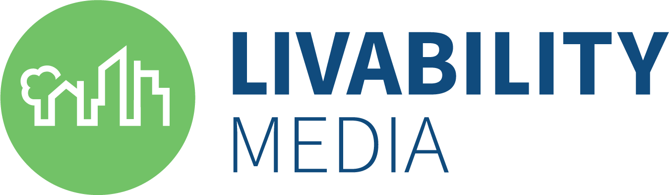 Green filled circle with a continuous line void in the middle outlining a tree, house, and two buildings; next to the words Livability Media in blue typeface